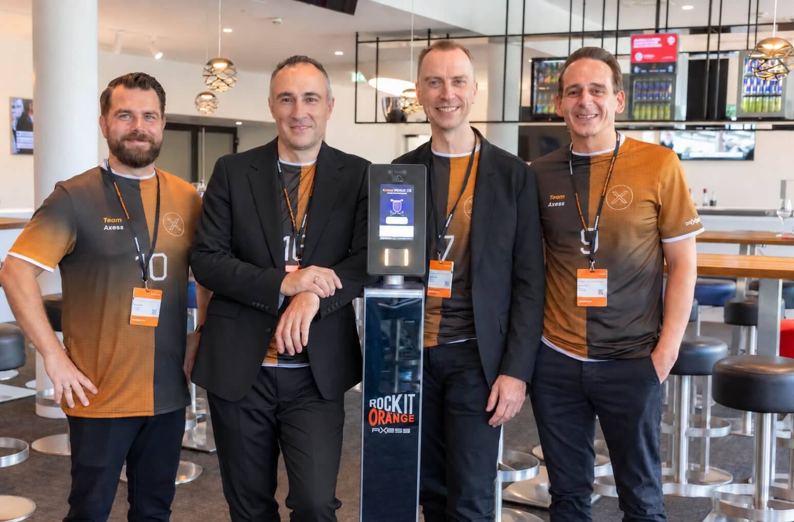 Manuel Schröder, Daniel Wakounig, Oliver Suter and Christian Heidegger with the Axess VENUE OS facial authentication terminal